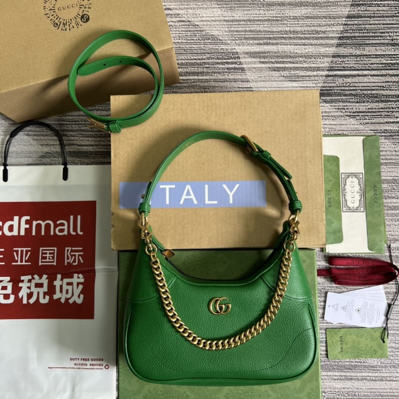 G*u*i top handle bags